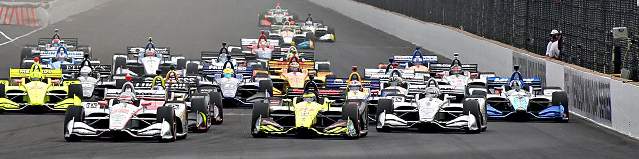 indy cars racing to through the start line Charlottesville